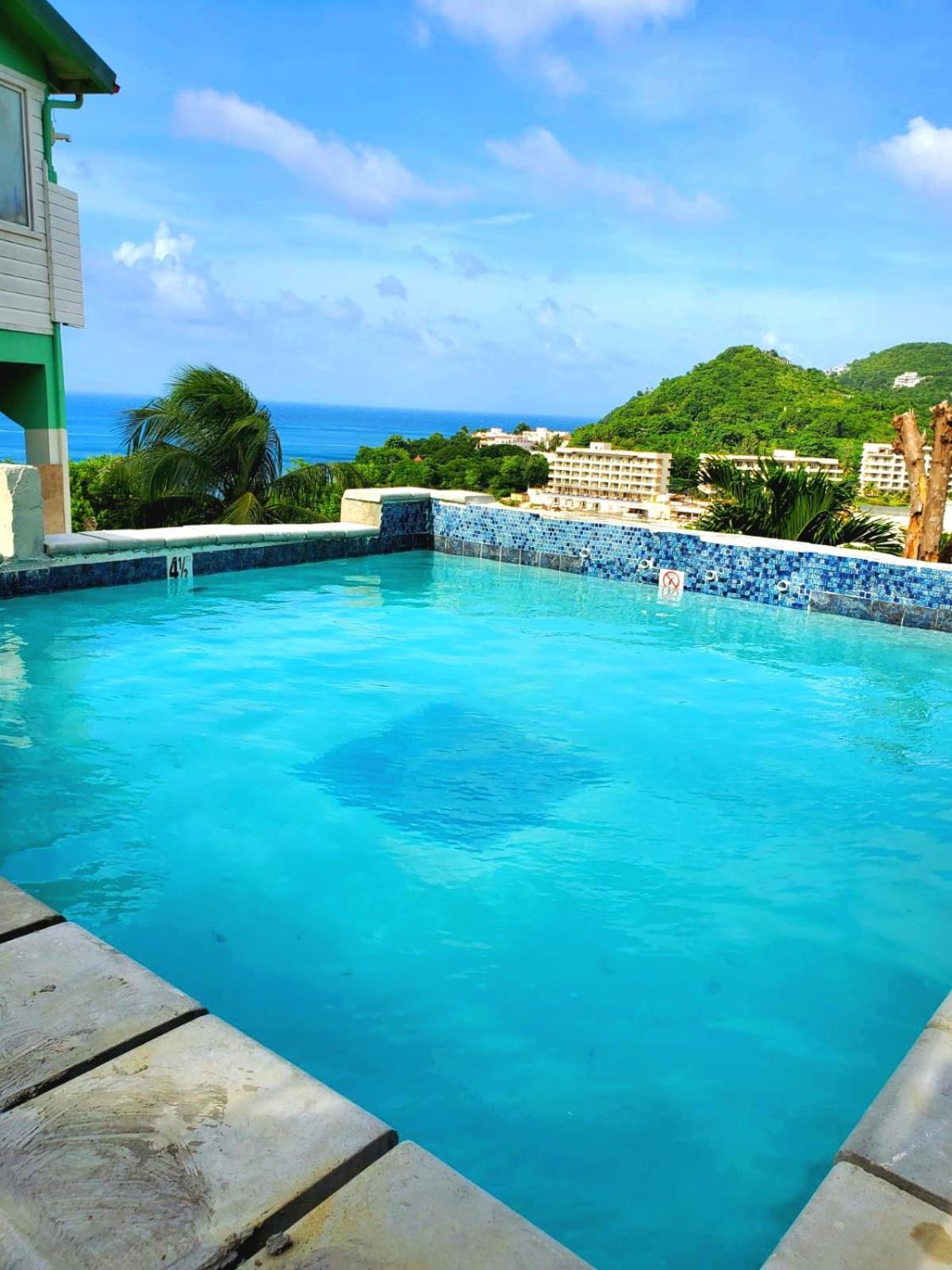 Beachfront Villa โกรส อิส์ลีต ภายนอก รูปภาพ